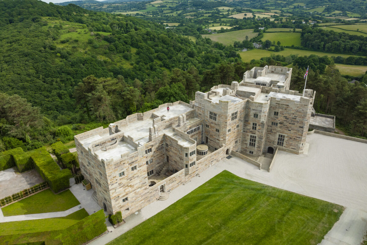 Aerial view over Castle. Dartmoor is in the background